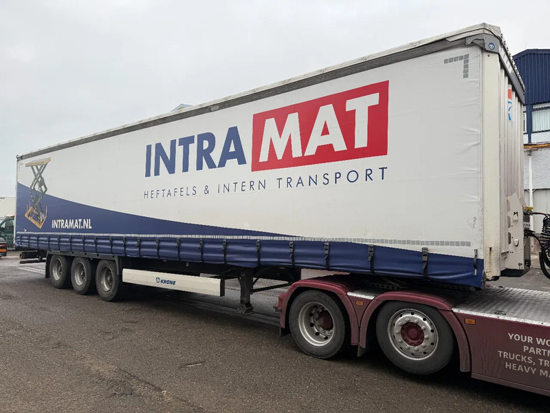Krone SD - 3 AXLE + ALU BORDEN + SLIDING ROOF - Полуприколка со церада: слика 2 Krone SD - 3 AXLE + ALU BORDEN + SLIDING ROOF - Полуприколка со церада: слика 2