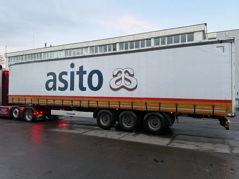 Krone WITH ALUMINIUM SIDEBOARDS, BPW AXLES, SLIDING ROOF - Полуприколка со церада: слика 4 Krone WITH ALUMINIUM SIDEBOARDS, BPW AXLES, SLIDING ROOF - Полуприколка со церада: слика 4
