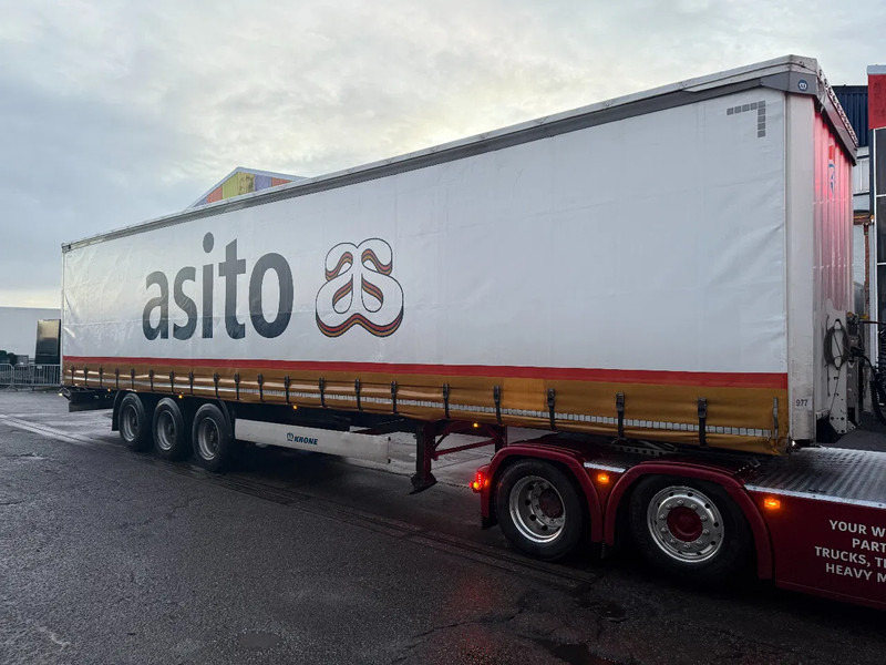 Krone WITH ALUMINIUM SIDEBOARDS, BPW AXLES, SLIDING ROOF - Полуприколка со церада: слика 5 Krone WITH ALUMINIUM SIDEBOARDS, BPW AXLES, SLIDING ROOF - Полуприколка со церада: слика 5