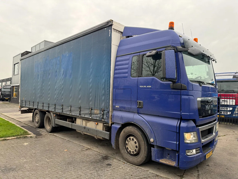 MAN TGX 26.400 6X2 - EURO 4 + LIFT + STEERING AXLE + TÜV 10-2025 - Камион со церада: слика 3 MAN TGX 26.400 6X2 - EURO 4 + LIFT + STEERING AXLE + TÜV 10-2025 - Камион со церада: слика 3