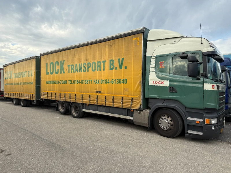 Scania R450 6X2 + DRACO AANHANGER 2010 TUV TILL 17-08-2026 - Камион со церада: слика 1 Scania R450 6X2 + DRACO AANHANGER 2010 TUV TILL 17-08-2026 - Камион со церада: слика 1