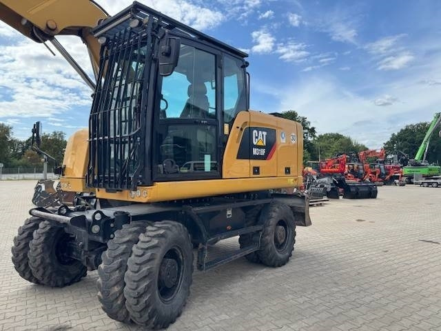 CAT M 318F - Багер на тркала: слика 1 CAT M 318F - Багер на тркала: слика 1