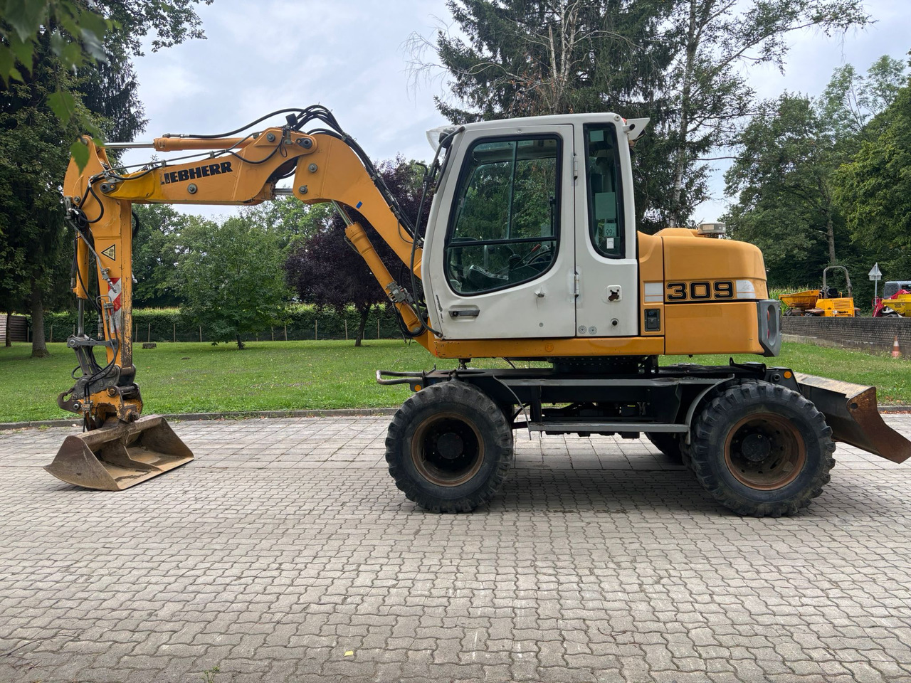 LIEBHERR A 309 Litronic - Багер на тркала: слика 1 LIEBHERR A 309 Litronic - Багер на тркала: слика 1