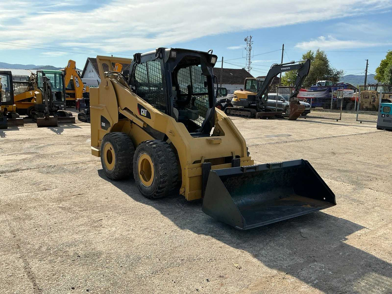 Caterpillar 246 C - Компактен натоварувач: слика 1 Caterpillar 246 C - Компактен натоварувач: слика 1
