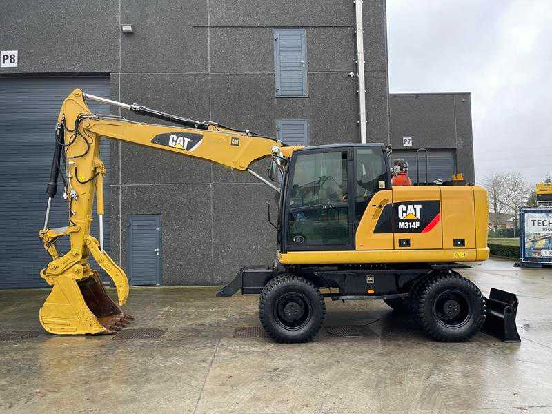 Caterpillar M314F - Багер на тркала: слика 1 Caterpillar M314F - Багер на тркала: слика 1