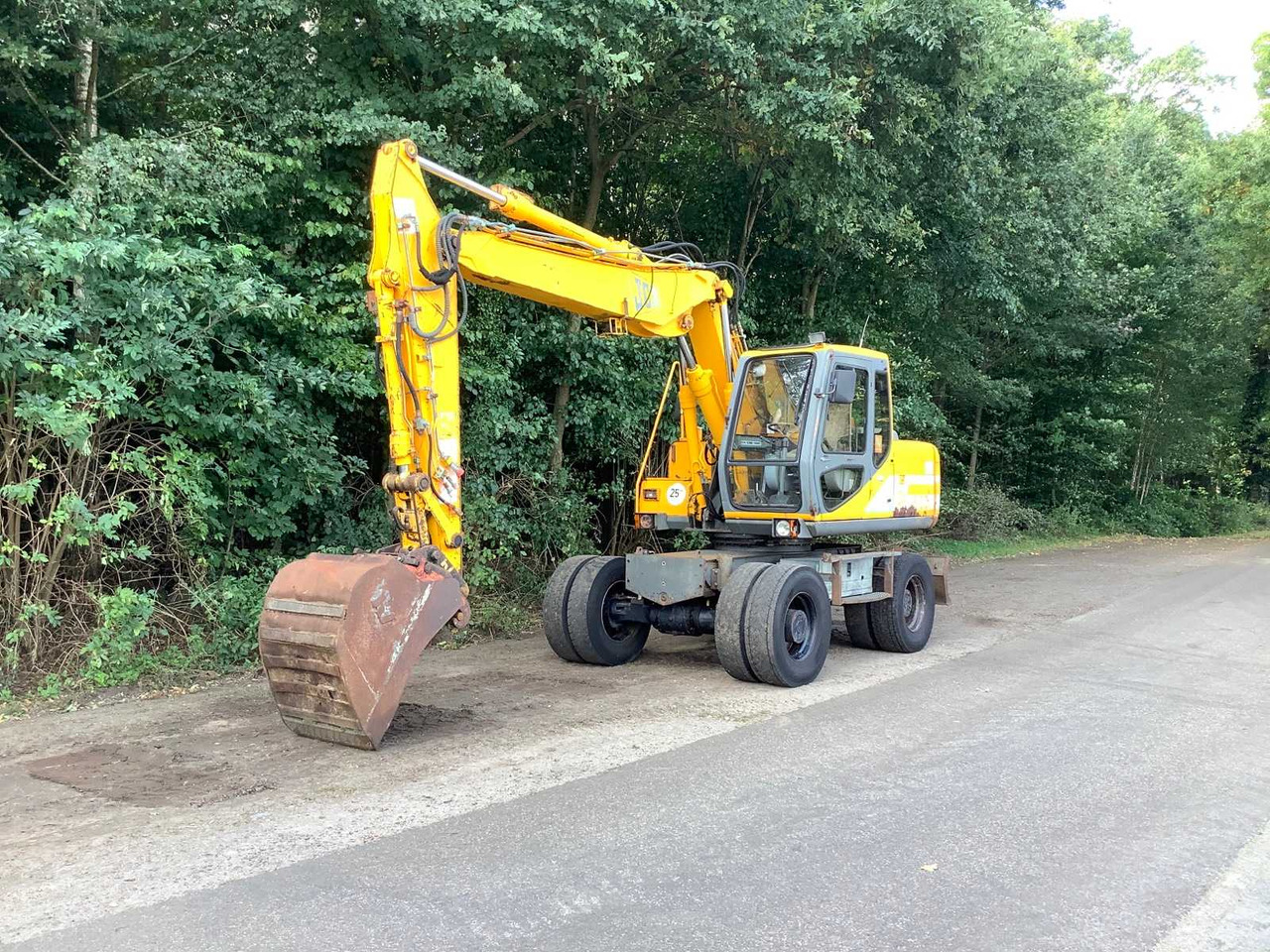 JCB JS130W - Багер на тркала: слика 1 JCB JS130W - Багер на тркала: слика 1