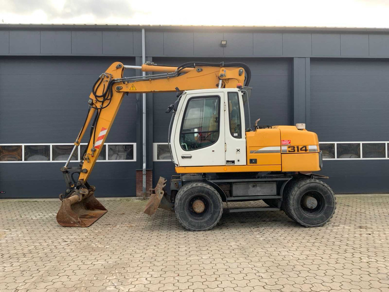 Liebherr A314 Litronic - Багер на тркала: слика 3 Liebherr A314 Litronic - Багер на тркала: слика 3