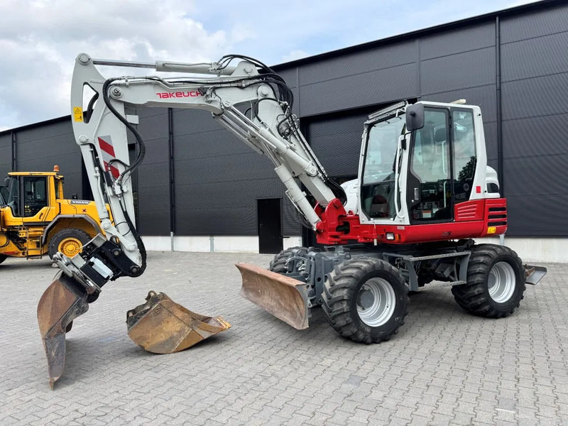 Takeuchi TB295W BJ 2021 3500 uur Compacttilt Draaikantelstuk met Gripper ! - Багер на тркала: слика 2 Takeuchi TB295W BJ 2021 3500 uur Compacttilt Draaikantelstuk met Gripper ! - Багер на тркала: слика 2