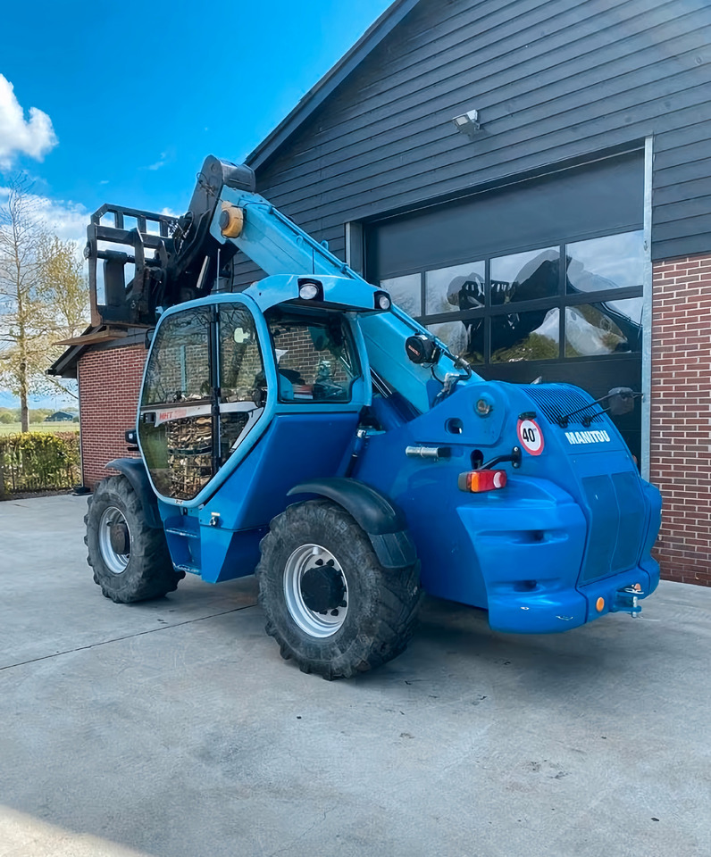 Manitou MHT 780 - Телескопски натоварувач на тркала: слика 3 Manitou MHT 780 - Телескопски натоварувач на тркала: слика 3