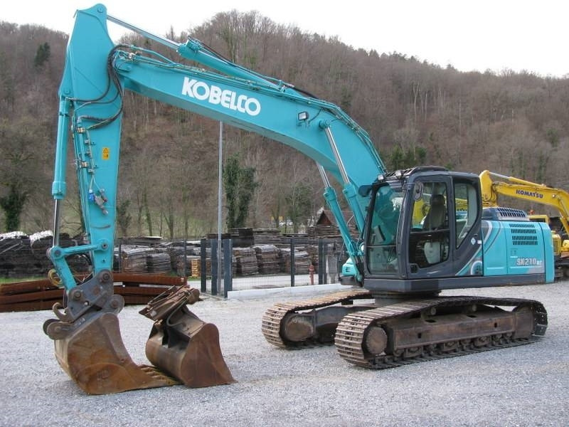 Kobelco SK210NLC-10 Vsa oprema TOP stanje - Багер гасеничар: слика 1 Kobelco SK210NLC-10 Vsa oprema TOP stanje - Багер гасеничар: слика 1