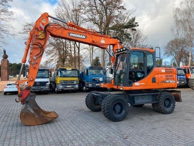 Doosan DX 160 W-3 - Багер на тркала: слика 1 Doosan DX 160 W-3 - Багер на тркала: слика 1