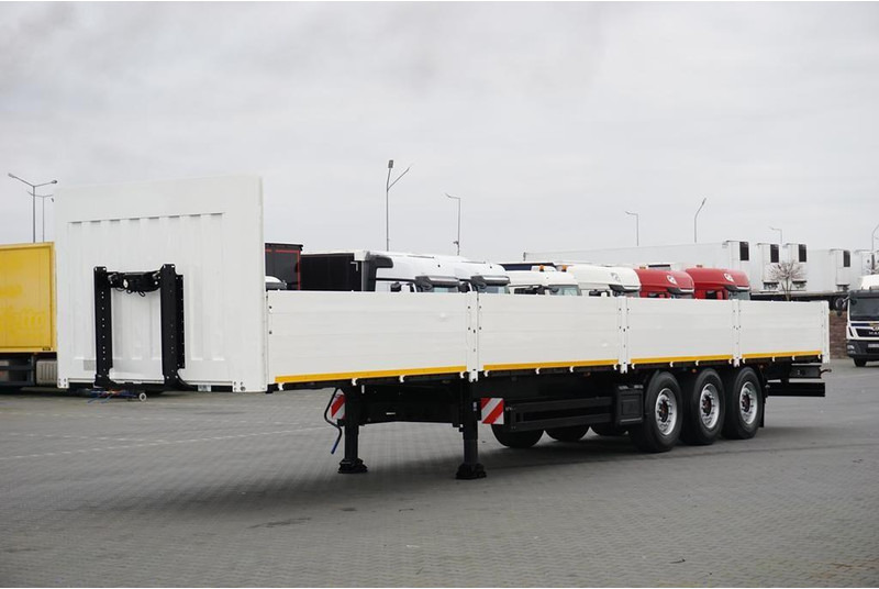 Kögel BURTOWA / BUDOWLANA / OŚ PODNOSZONA - Полуприколка платформа: слика 1 Kögel BURTOWA / BUDOWLANA / OŚ PODNOSZONA - Полуприколка платформа: слика 1