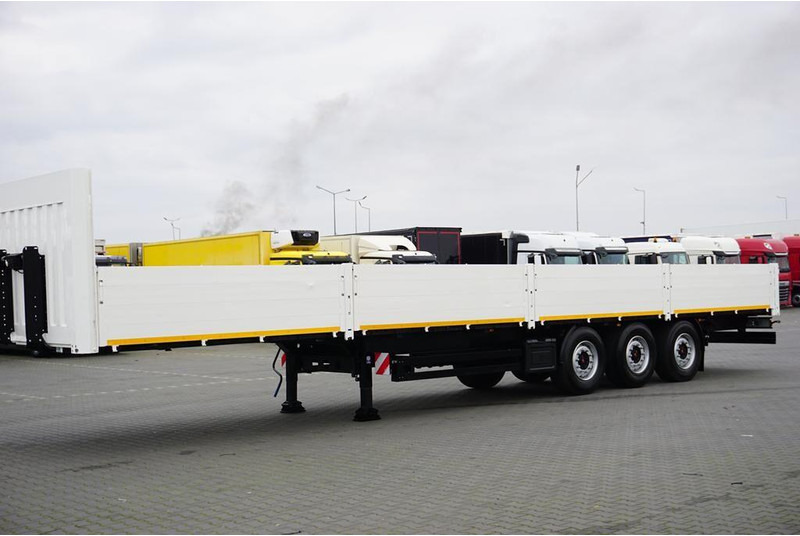 Kögel BURTOWA / BUDOWLANA / OŚ PODNOSZONA - Полуприколка платформа: слика 3 Kögel BURTOWA / BUDOWLANA / OŚ PODNOSZONA - Полуприколка платформа: слика 3