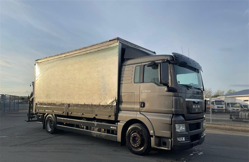 MAN TGX 18.400 Curtain Sider + Crane Palfinger 14002 EH - Камион сандучар: слика 1 MAN TGX 18.400 Curtain Sider + Crane Palfinger 14002 EH - Камион сандучар: слика 1