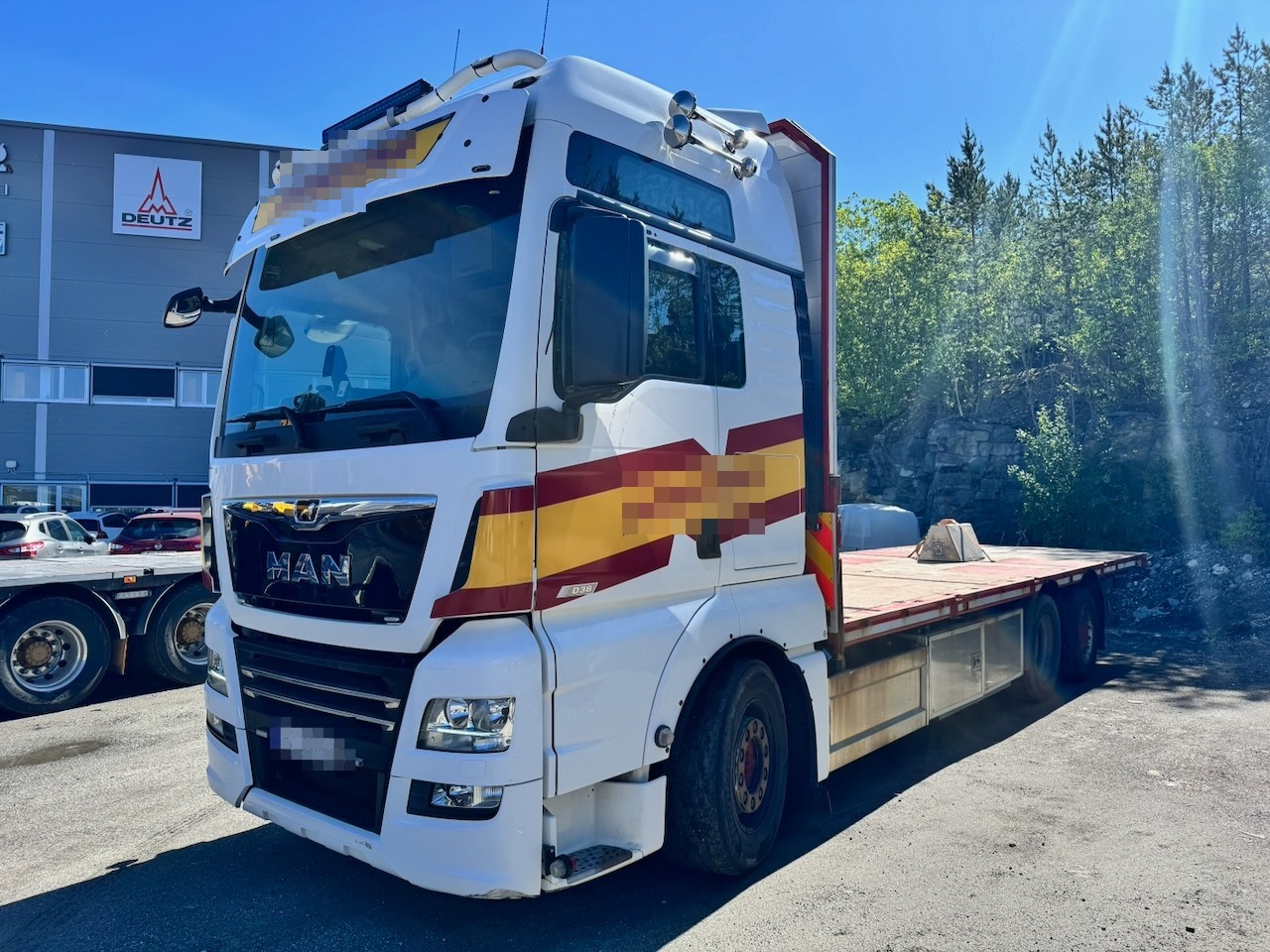 MAN TGX 580 - Камион со платформа: слика 1 MAN TGX 580 - Камион со платформа: слика 1