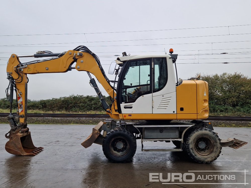 2014 Liebherr A910 Compact - Багер на тркала: слика 2 2014 Liebherr A910 Compact - Багер на тркала: слика 2