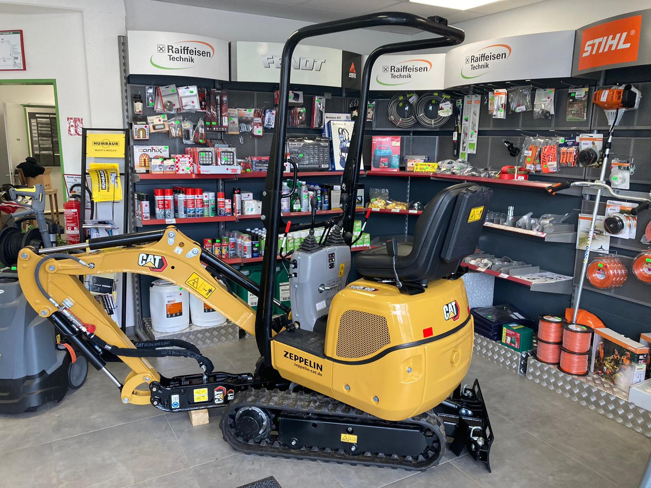 Caterpillar Mobilbagger 300.9D - Багер: слика 1 Caterpillar Mobilbagger 300.9D - Багер: слика 1