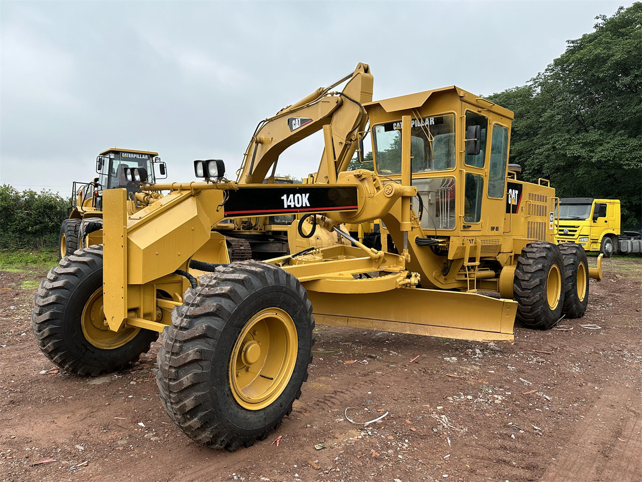 CATERPILLAR 140K - Порамнувач: слика 1 CATERPILLAR 140K - Порамнувач: слика 1