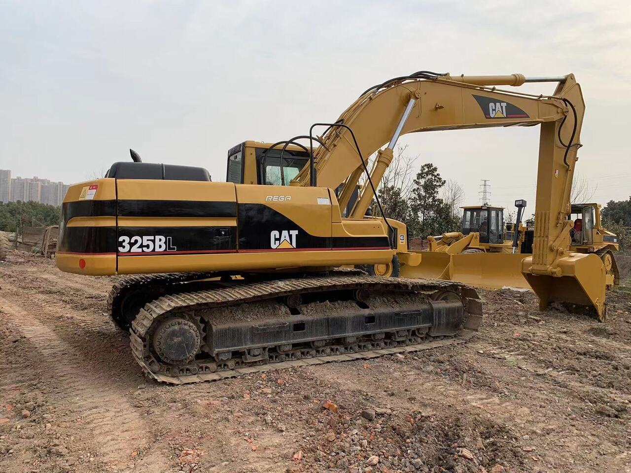 CATERPILLAR 325BL - Багер: слика 1 CATERPILLAR 325BL - Багер: слика 1