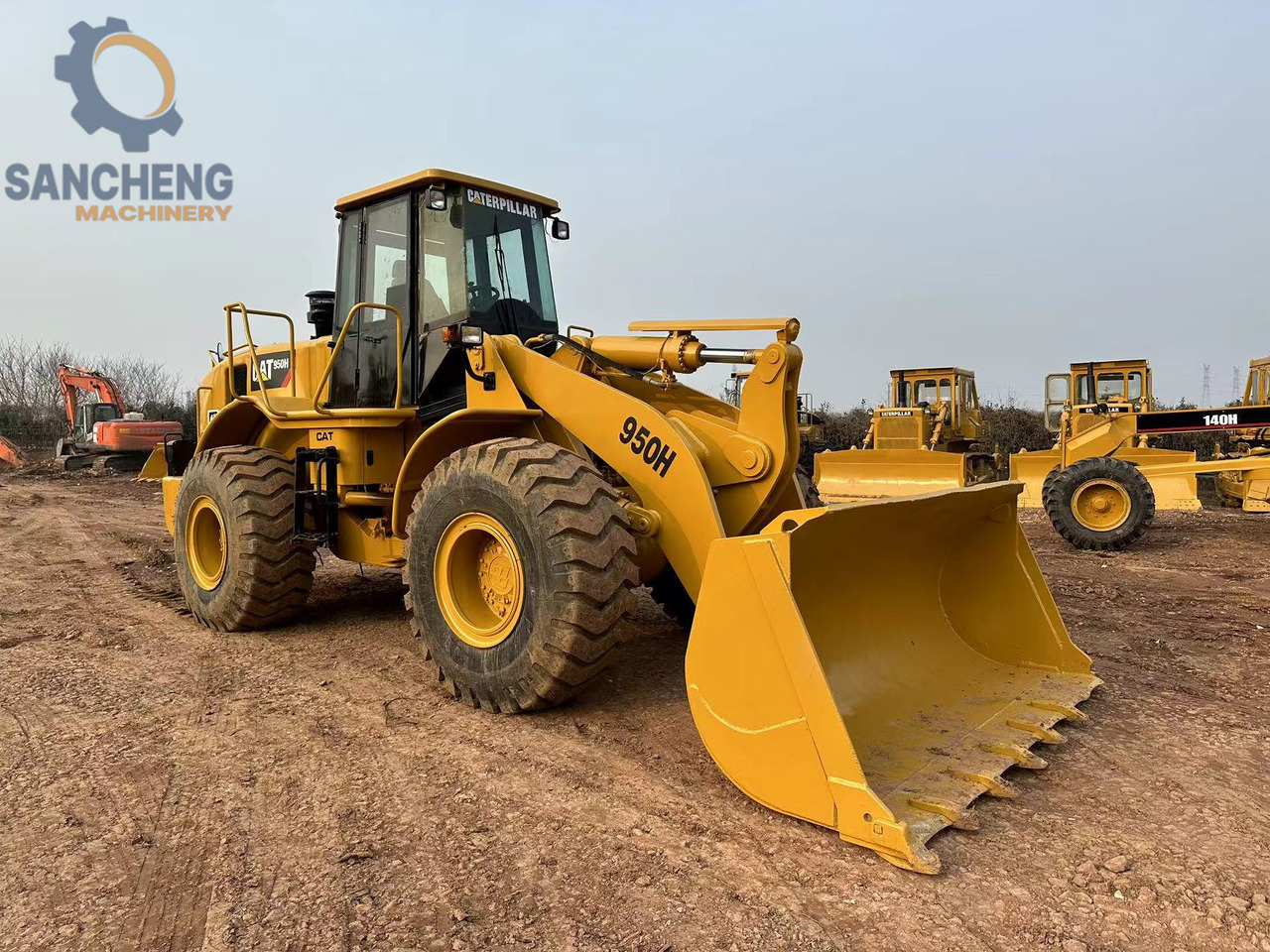 CATERPILLAR 950H - Натоварувач на тркала: слика 1 CATERPILLAR 950H - Натоварувач на тркала: слика 1