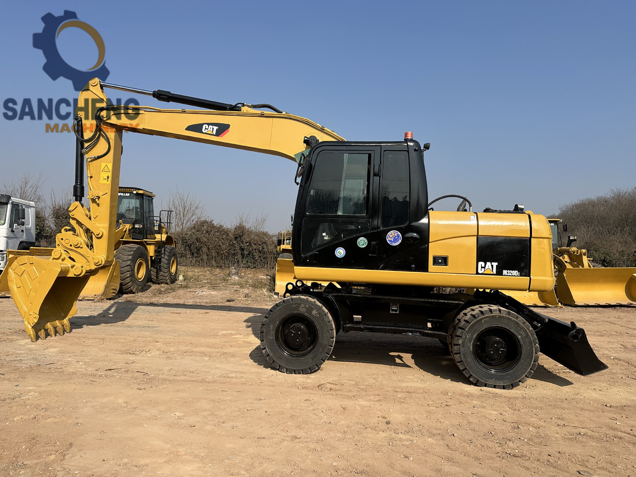 CATERPILLAR M320D2 - Багер на тркала: слика 3 CATERPILLAR M320D2 - Багер на тркала: слика 3