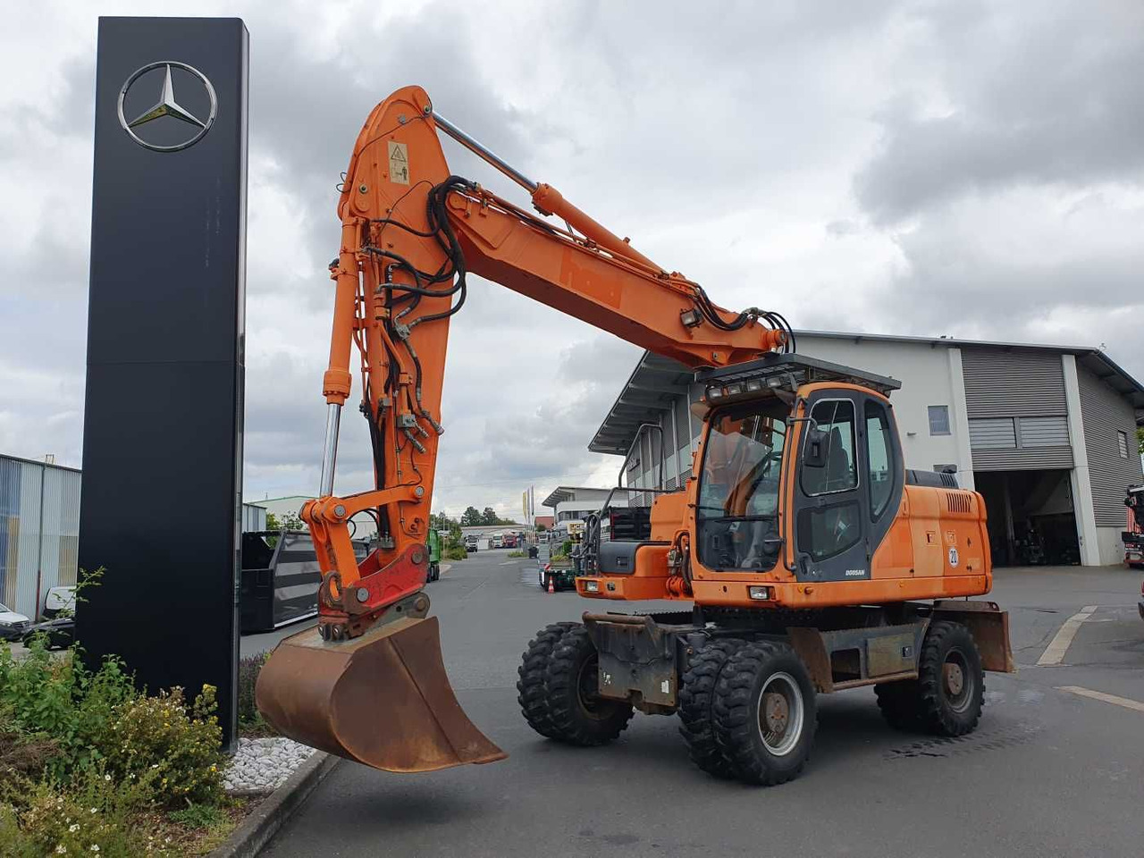 Doosan DX190W / 2008 / 12.349h / 1x Tieflöffel - Багер на тркала: слика 1 Doosan DX190W / 2008 / 12.349h / 1x Tieflöffel - Багер на тркала: слика 1