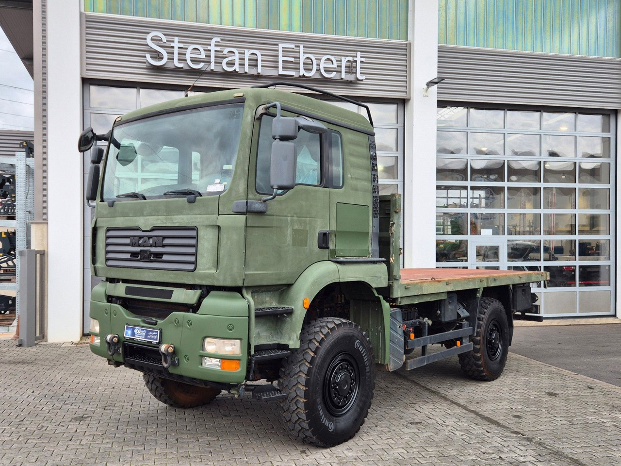 MAN TGA 18.360 4x4 BB Pritsche Single Bereifung - Камион со платформа: слика 1 MAN TGA 18.360 4x4 BB Pritsche Single Bereifung - Камион со платформа: слика 1