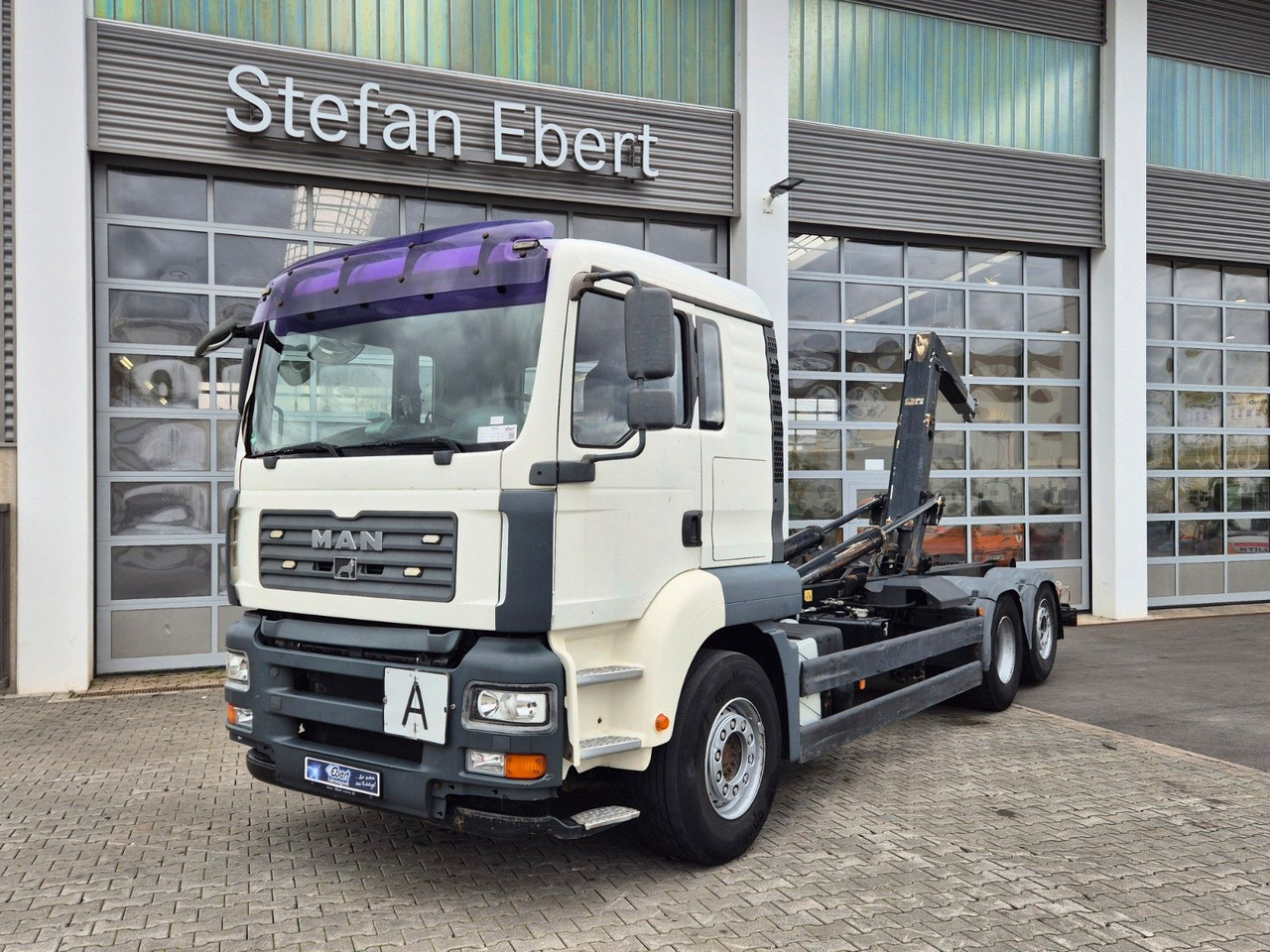 MAN TGA 26.440 6x2-2 BL Meiller RK 20.70 Bett - Камион со кука за подигање: слика 2 MAN TGA 26.440 6x2-2 BL Meiller RK 20.70 Bett - Камион со кука за подигање: слика 2