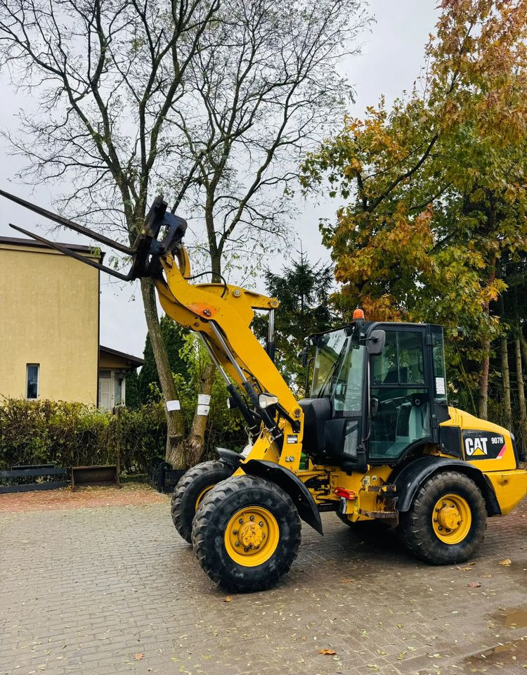 Caterpillar 907H - Натоварувач на тркала: слика 1 Caterpillar 907H - Натоварувач на тркала: слика 1