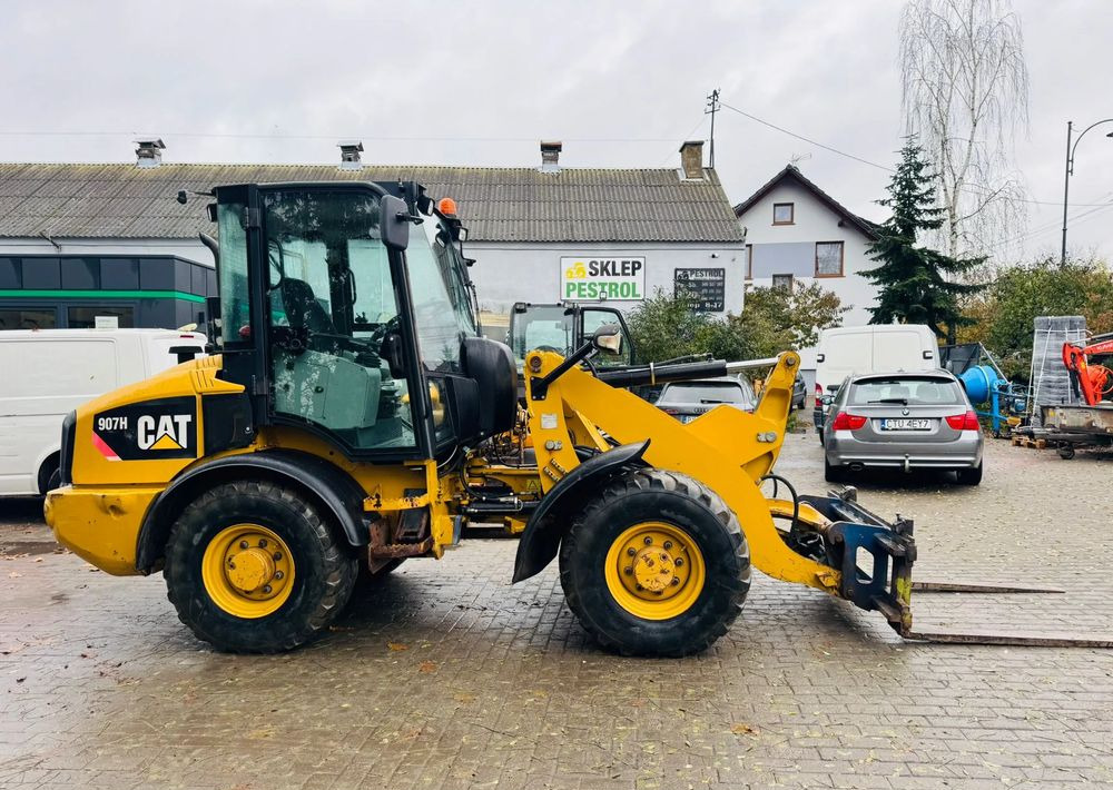 Caterpillar 907H - Натоварувач на тркала: слика 5 Caterpillar 907H - Натоварувач на тркала: слика 5