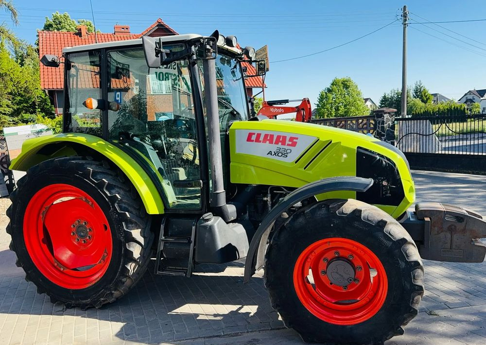 Claas Axos 330 - Трактор: слика 1 Claas Axos 330 - Трактор: слика 1