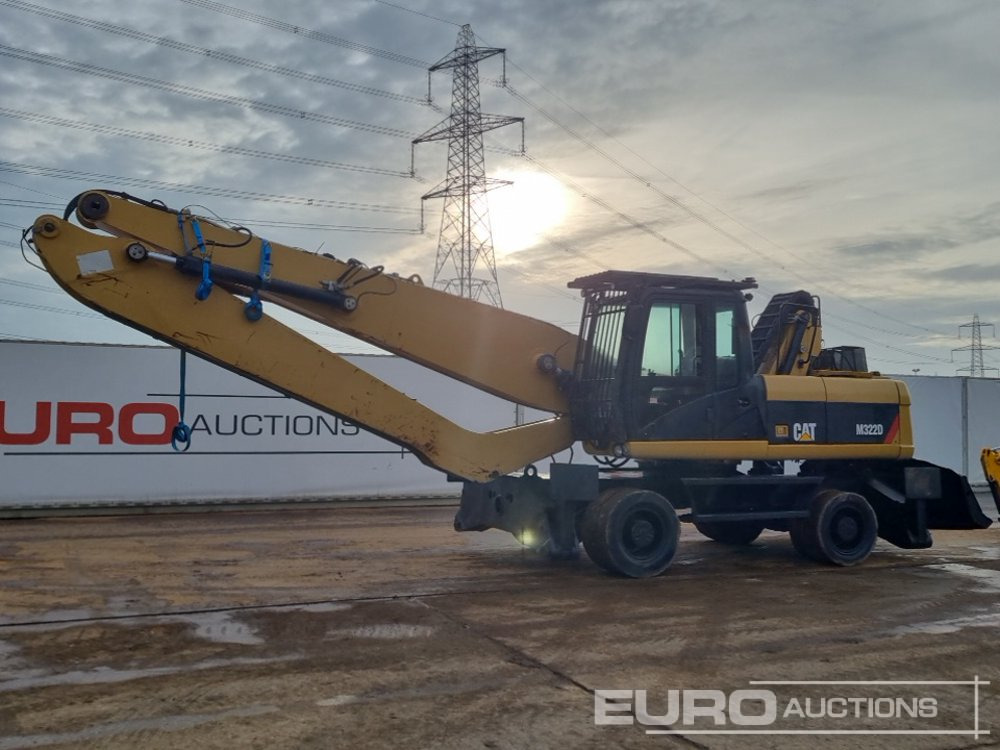 CAT M322D - Багер на тркала: слика 1 CAT M322D - Багер на тркала: слика 1