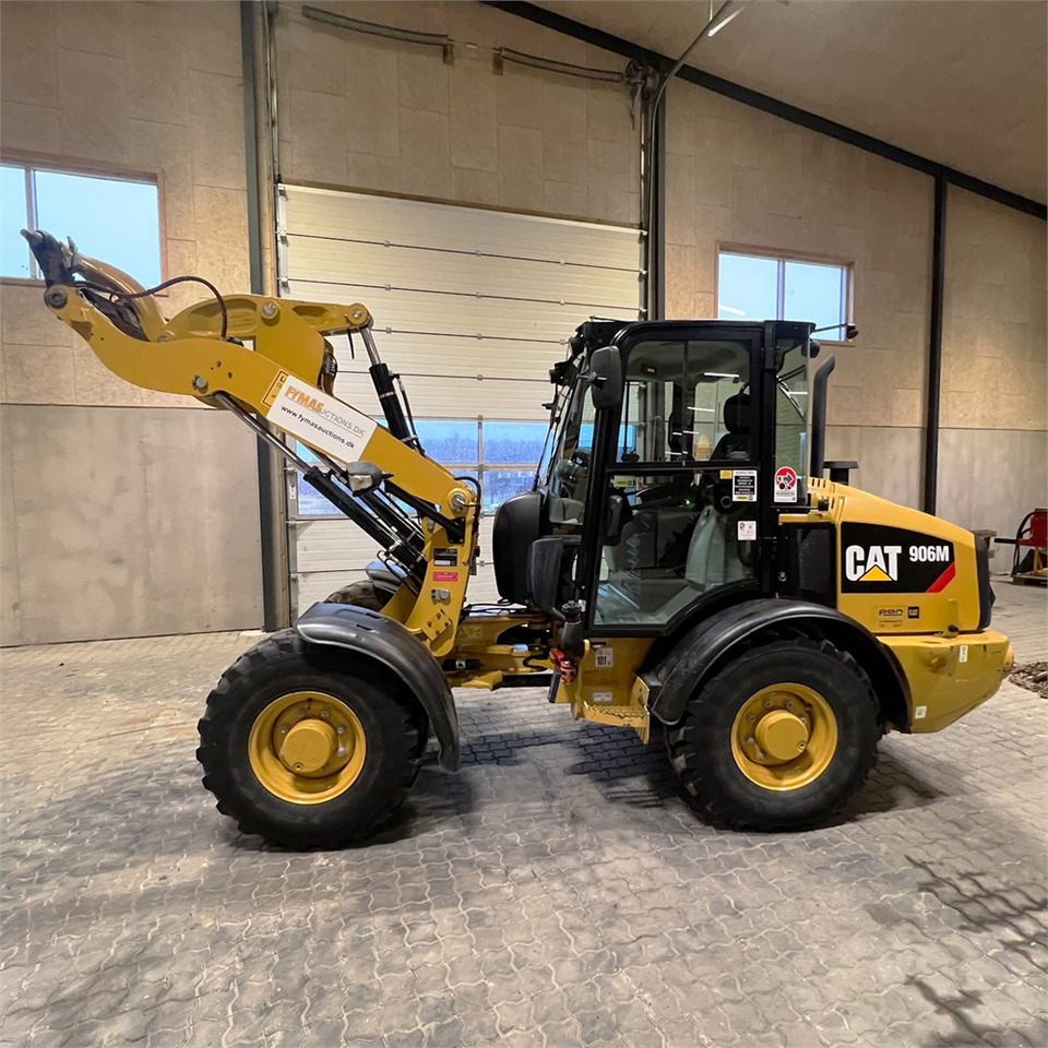 Caterpillar 906 M - Натоварувач на тркала: слика 1 Caterpillar 906 M - Натоварувач на тркала: слика 1