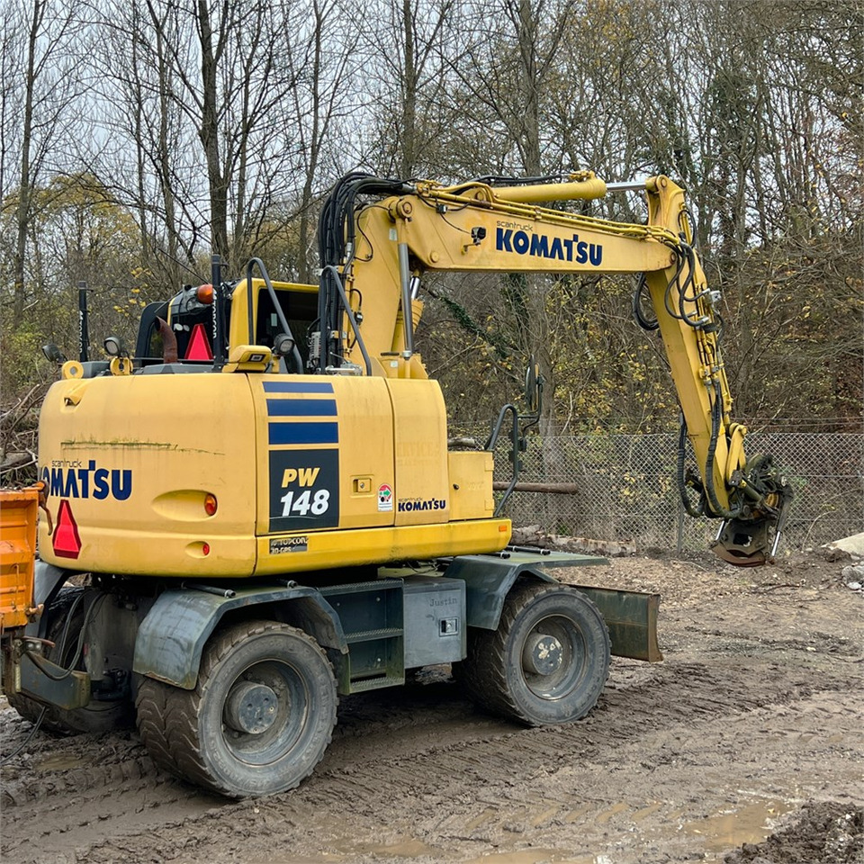 Komatsu PW148-10 - Багер на тркала: слика 1 Komatsu PW148-10 - Багер на тркала: слика 1