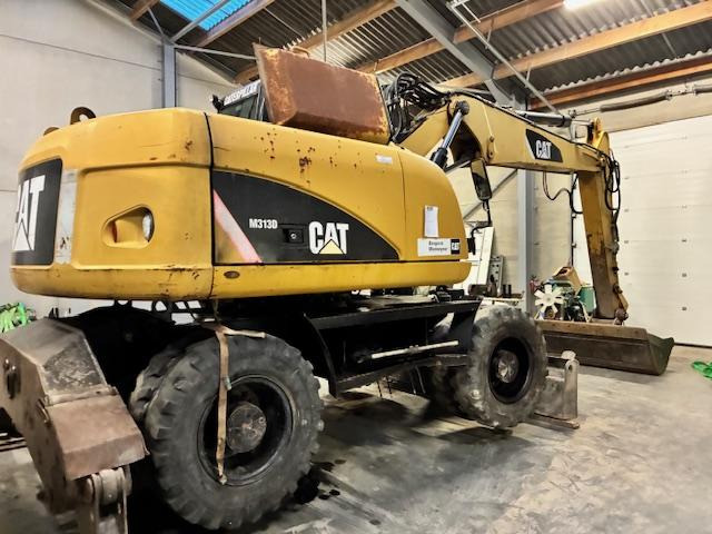 Caterpillar M 313D - Багер на тркала: слика 2 Caterpillar M 313D - Багер на тркала: слика 2