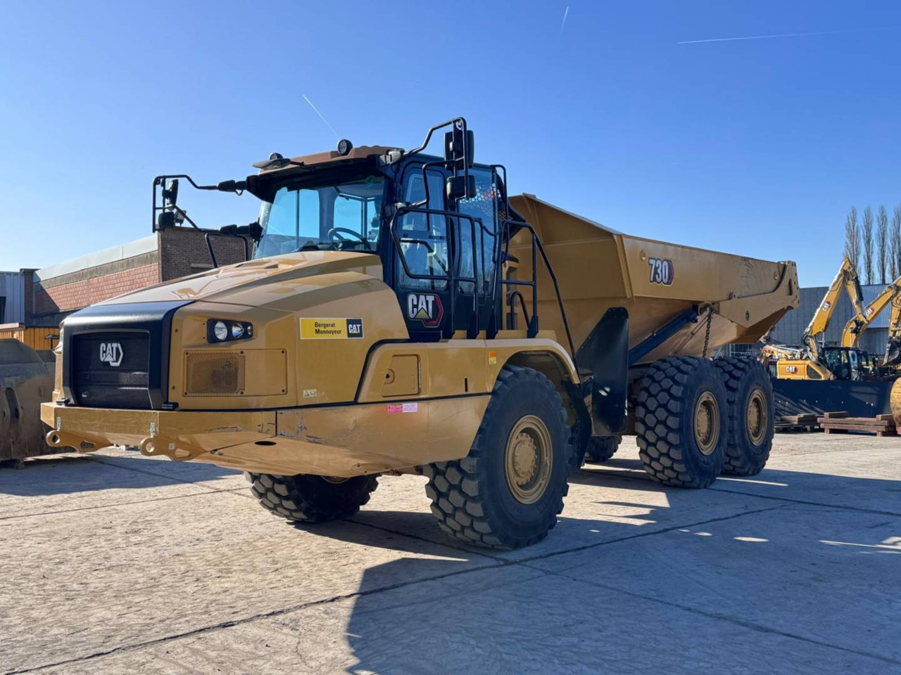 CAT 730-04 - Зглобен истоварувач: слика 1 CAT 730-04 - Зглобен истоварувач: слика 1