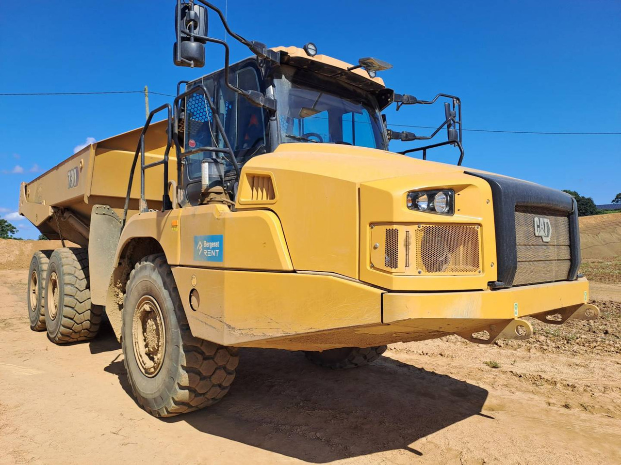 CAT 730 - Зглобен истоварувач: слика 1 CAT 730 - Зглобен истоварувач: слика 1