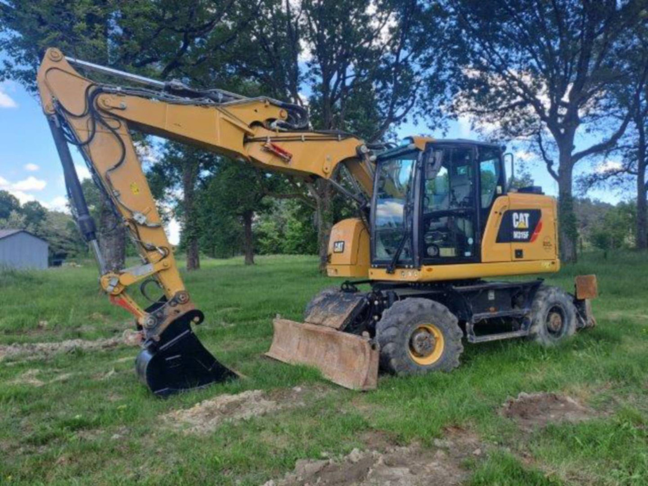 CAT M315F IVC - Багер на тркала: слика 1 CAT M315F IVC - Багер на тркала: слика 1