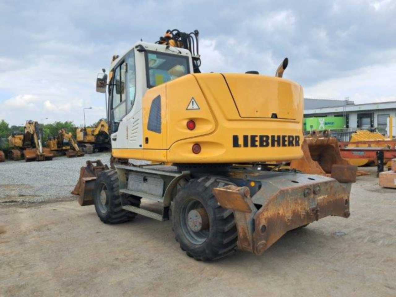 LIEBHERR A914 - Багер на тркала: слика 1 LIEBHERR A914 - Багер на тркала: слика 1