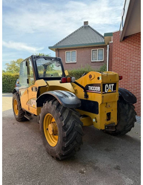 Caterpillar TH330B - Телескопски ракувач: слика 5 Caterpillar TH330B - Телескопски ракувач: слика 5