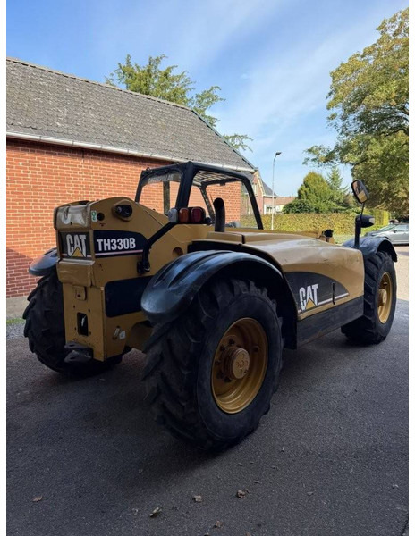 Caterpillar TH330B - Телескопски ракувач: слика 4 Caterpillar TH330B - Телескопски ракувач: слика 4