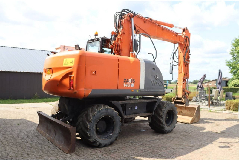 Багер на тркала Hitachi ZX140W-3: слика 6