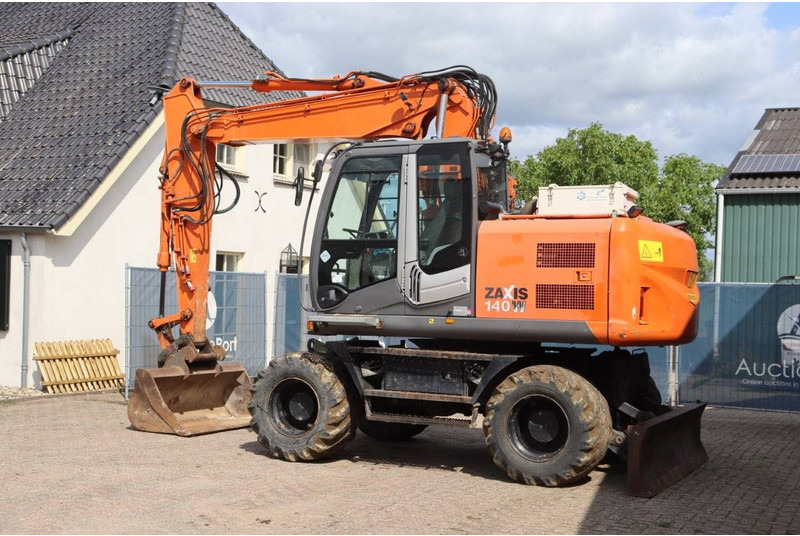 Hitachi ZX140W-3 - Багер на тркала: слика 3 Hitachi ZX140W-3 - Багер на тркала: слика 3
