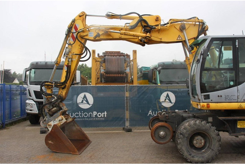 Багер на тркала New Holland MH5 Plus: слика 9 Багер на тркала New Holland MH5 Plus: слика 9