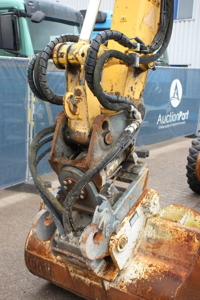 Багер на тркала New Holland MH5 Plus: слика 14 Багер на тркала New Holland MH5 Plus: слика 14