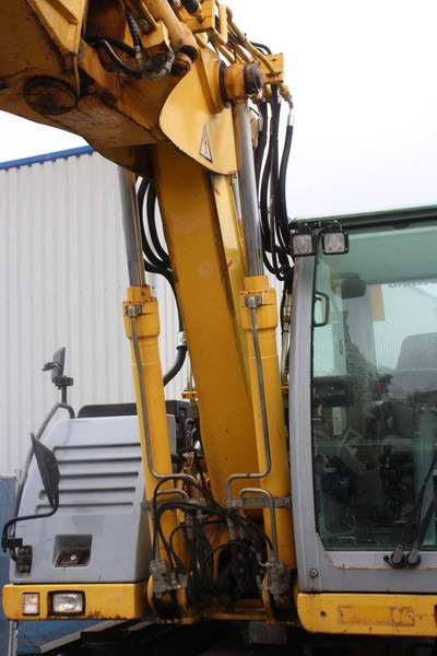 Багер на тркала New Holland MH5 Plus: слика 16 Багер на тркала New Holland MH5 Plus: слика 16