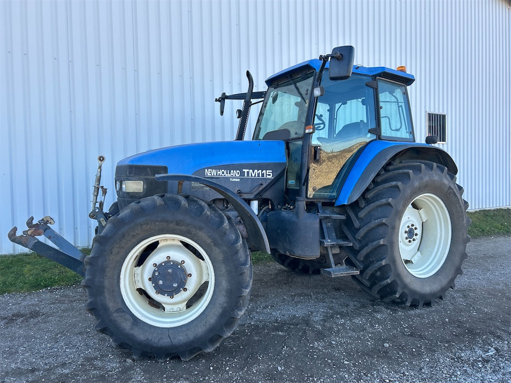 New Holland TM115 (2001) - Трактор: слика 1 New Holland TM115 (2001) - Трактор: слика 1