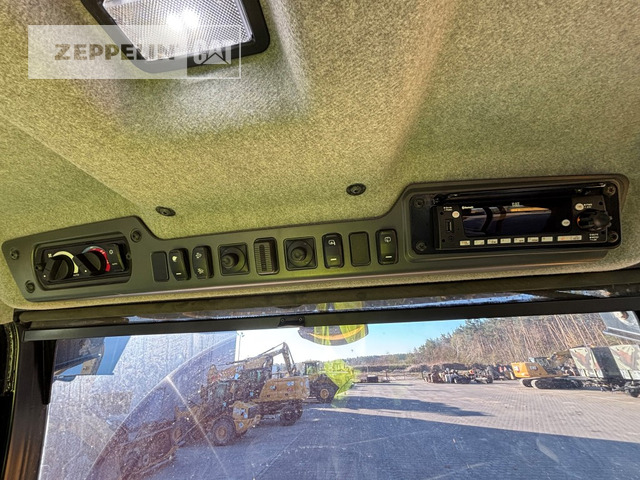 Зглобен истоварувач Cat 725-04A: слика 19