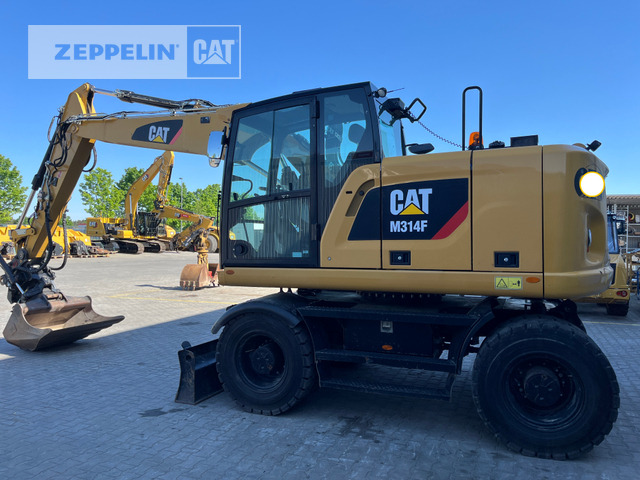 Cat M314F - Багер на тркала: слика 1 Cat M314F - Багер на тркала: слика 1
