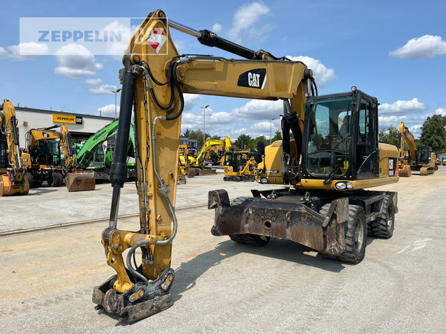Cat M318D - Багер на тркала: слика 1 Cat M318D - Багер на тркала: слика 1